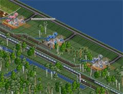 In the picture coming from the most respected server for OpenTTD, “Brianetta’s Standard”, a risky business is going on. Flooding always a possibility, a reinforced dam holds back a huge reservoir. Several water pumps draw water off for transport all across the desert, promising mountains of gold for those daring enough to supply the large number of plantations and farms out there.